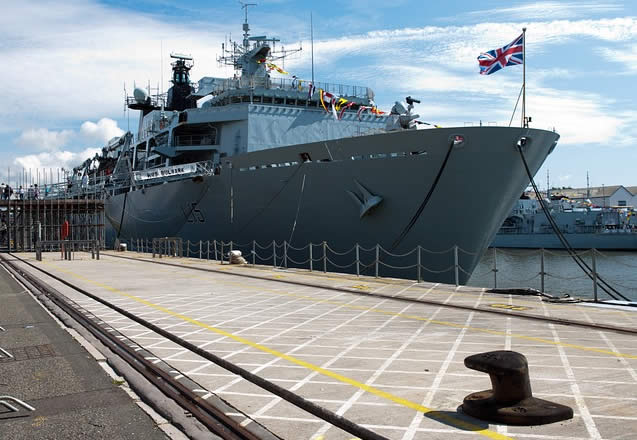 HMS Bulwark (grey naval ship still in service) docked at Plymouth - royal navy technology